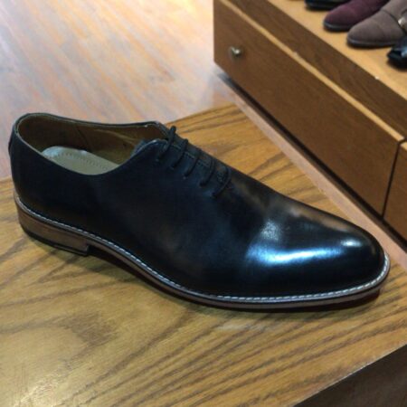 Black Whole cut with brown white sole